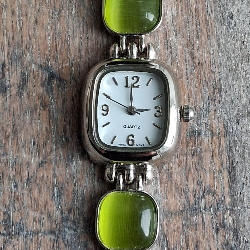 SILVER TONE & GREEN STONE WRIST WATCH